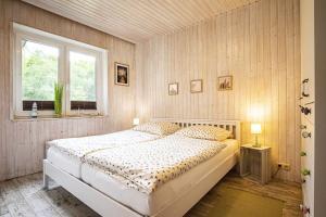 Postel nebo postele na pokoji v ubytování Fasanennest im Wikingerhof