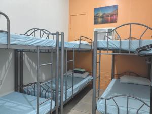 Voodi või voodid majutusasutuse Nappers Hostel toas
