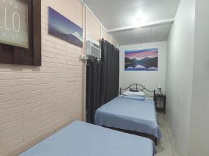 Voodi või voodid majutusasutuse Nappers Hostel toas