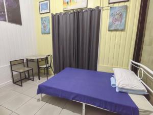 Voodi või voodid majutusasutuse Nappers Hostel toas