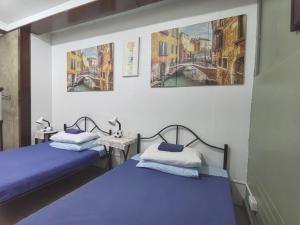 Voodi või voodid majutusasutuse Nappers Hostel toas