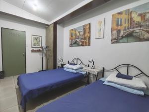 Voodi või voodid majutusasutuse Nappers Hostel toas
