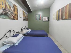 Voodi või voodid majutusasutuse Nappers Hostel toas