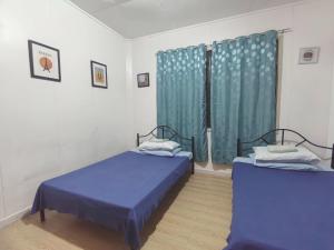 Voodi või voodid majutusasutuse Nappers Hostel toas