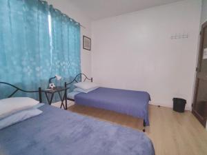 Voodi või voodid majutusasutuse Nappers Hostel toas