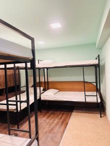 Postel nebo postele na pokoji v ubytování future hostel
