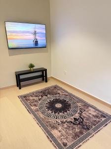 TV a/nebo společenská místnost v ubytování SWM Hotel