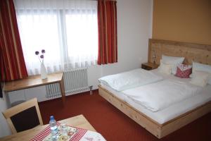 Postel nebo postele na pokoji v ubytování Landhaus Seehof