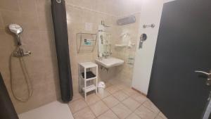Koupelna v ubytování Hotel La Peyrade