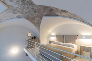 Ένα ή περισσότερα κρεβάτια σε δωμάτιο στο Casina Bellanova