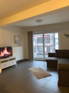 Χώρος καθιστικού στο Stijlvol appartement in hartje Oostende vlak bij het strand en de winkelstraat - 6p