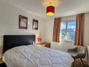 Postel nebo postele na pokoji v ubytování Confortable 2 pièces · Balcon Sud · Animaux acceptés · Parking couvert - FR-1-425-188