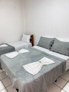Postel nebo postele na pokoji v ubytování Pousada da Orla