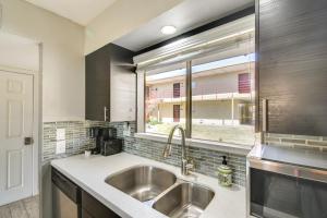 a kitchen with a sink and a window at Near Fashion Square and Old Town Scottsdale Condo! in Scottsdale +16 photos