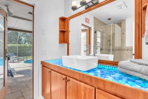 Der Swimmingpool an oder in der Nähe von Family Beach Home With Home Theater & Heated Pool!