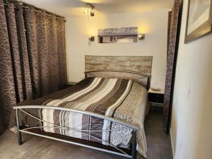a bedroom with a bunk bed in a room at Appart Rez de jardin vue mer in Cavalaire-sur-Mer