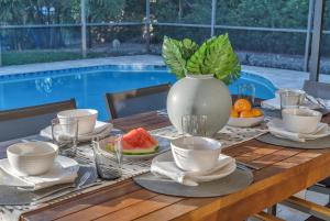 Der Swimmingpool an oder in der Nähe von Family Beach Home With Home Theater & Heated Pool!