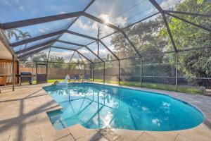 Der Swimmingpool an oder in der Nähe von Family Beach Home With Home Theater & Heated Pool!