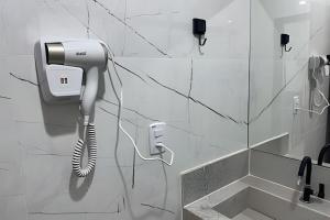 Ένα μπάνιο στο Aconchegante Apartamento com Ar Condicionado +33 φωτογραφίες