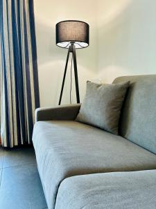 Posezení v ubytování FC Home Suite + 37 fotografií