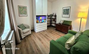 TV a/nebo společenská místnost v ubytování Riccio