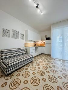 Η κουζίνα ή μικρή κουζίνα στο Angiolieri Flexrent - Immobiliare Abissinia