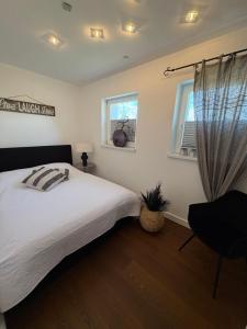 Ένα ή περισσότερα κρεβάτια σε δωμάτιο στο Schönes Ferienhaus unterhalb der Wasserkuppe Hilders