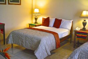 Postel nebo postele na pokoji v ubytování Hotel Ipsan Nah