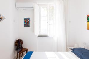 A bed or beds in a room at Villa Elizabeth