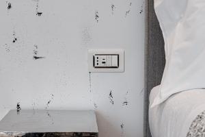 A bed or beds in a room at Guicciardini 24