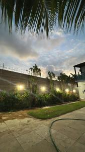 a building with lights on the side of it at Wcasadepraia in Maragogi