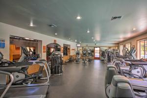 a gym with rows of treadmills and machines at 8 Mi to Lake Tahoe Spacious Northstar Condo! in Truckee