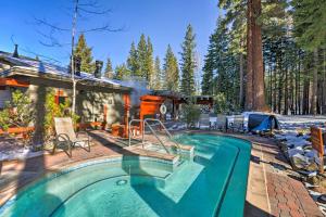 a house with a swimming pool next to a house at 8 Mi to Lake Tahoe Spacious Northstar Condo! in Truckee