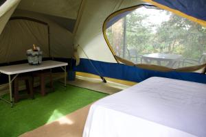 Postel nebo postele na pokoji v ubytování Villa Campo's