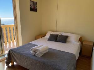 Ένα ή περισσότερα κρεβάτια σε δωμάτιο στο SOHO Apartments +33 φωτογραφίες
