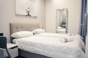 Letto o letti in una camera di House 21 Residence Room