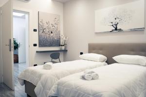 Letto o letti in una camera di House 21 Residence Room