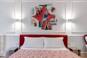 A bed or beds in a room at Guicciardini 24