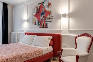 A bed or beds in a room at Guicciardini 24