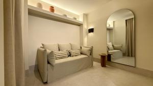 Posezení v ubytování Cosy Rooms Tapinería