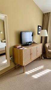 TV a/nebo společenská místnost v ubytování Hotel Vanilla