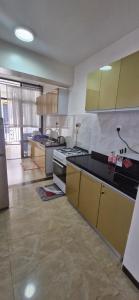 Una cocina o cocineta en Avalor Suites - Marcus Garvey