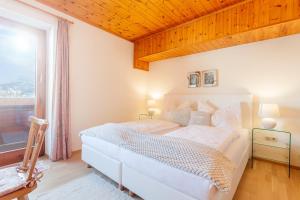 Posteľ alebo postele v izbe v ubytovaní Holiday im Gästehaus Warter in Altenmarkt