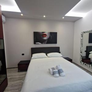 Letto o letti in una camera di House 21 Residence Room