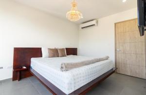 Ένα ή περισσότερα κρεβάτια σε δωμάτιο στο Luxury apartment at Galerias