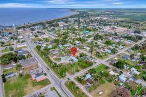 an aerial view of a suburb with a red marker at Charming 2 bed 1 Bath in Pahokee in Pahokee