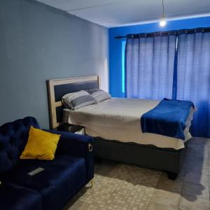 Letto o letti in una camera di Greggs Place at Capital Hill Arcadia