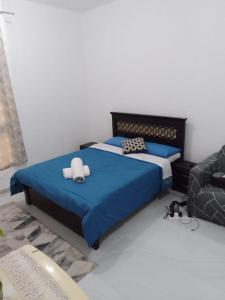 Ένα ή περισσότερα κρεβάτια σε δωμάτιο στο SINGKO #My HOmE #2