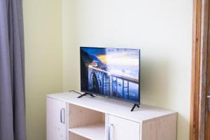 TV a/nebo společenská místnost v ubytování Peaceful flat