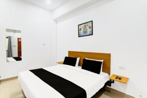 Postel nebo postele na pokoji v ubytování Super Hotel O JP INN